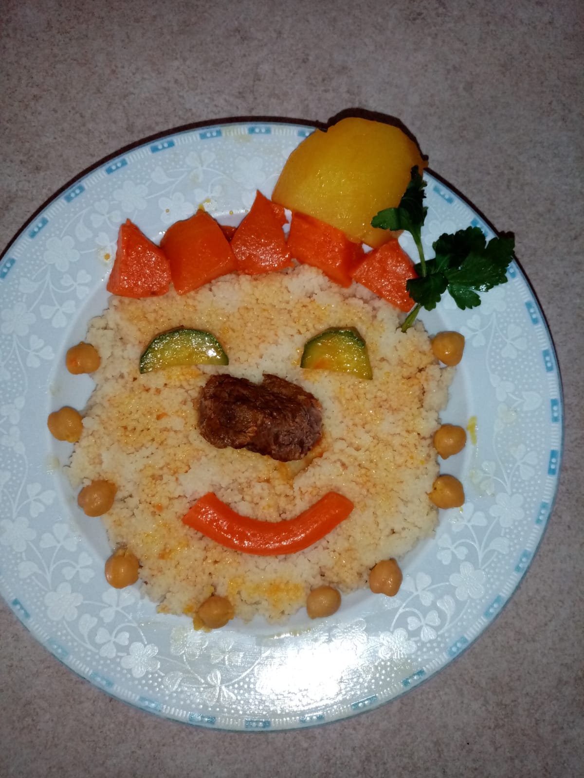 A smiling face made from food, from the 2020 recipe competition archive